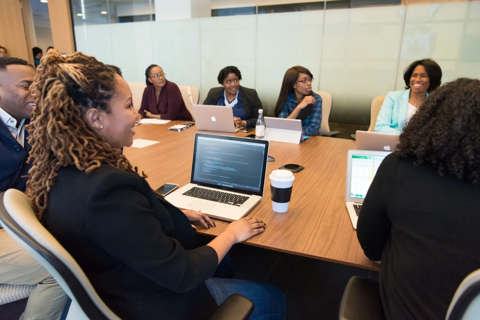 Business meeting using a laptop to schedule appointments