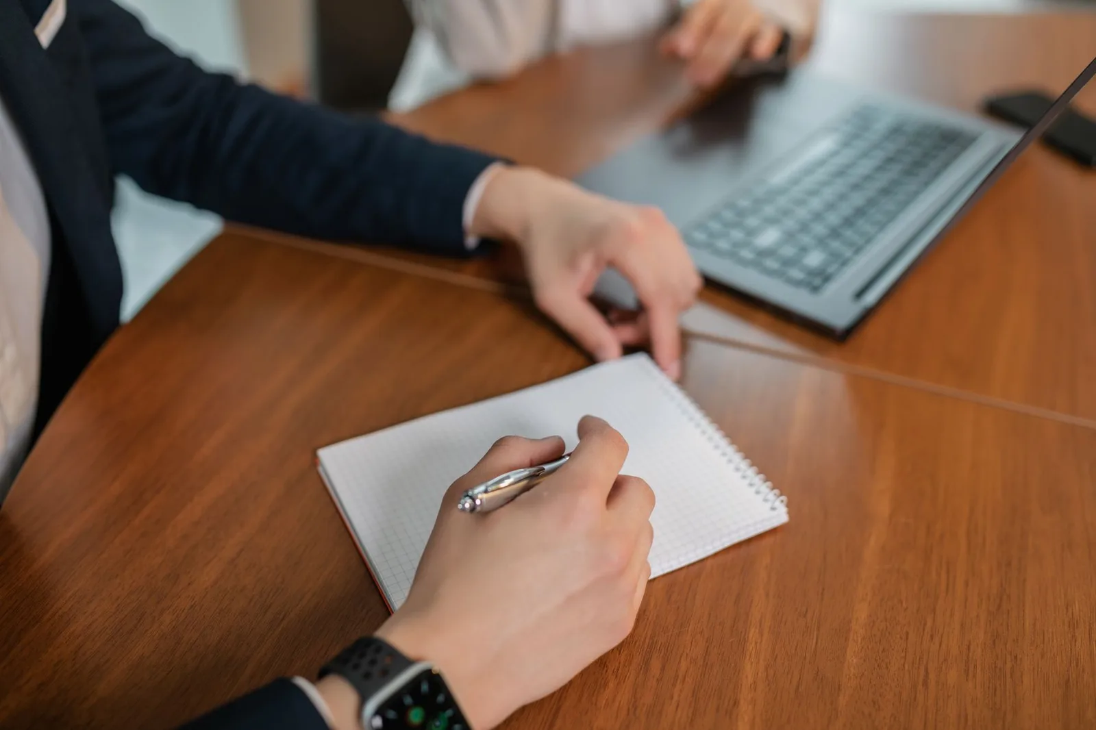 A business owner using an online booking system