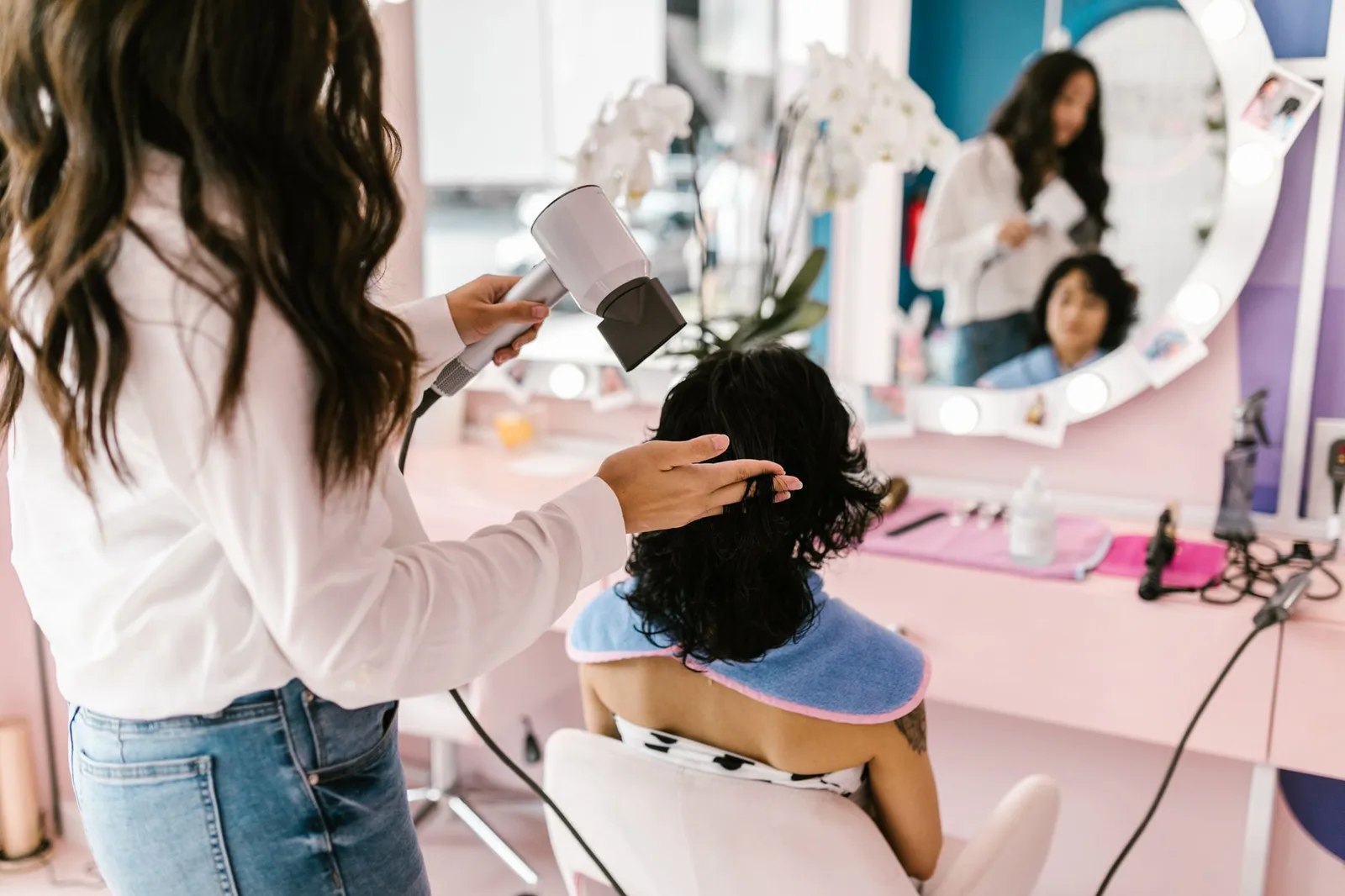 Interior of a modern beauty salon with clients