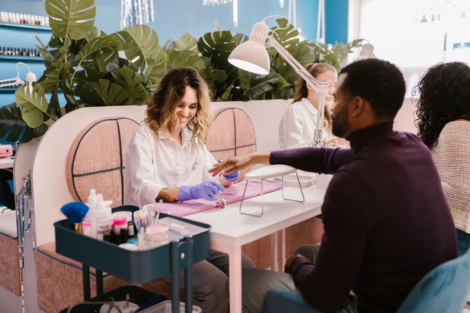 Interior of a modern beauty salon with clients