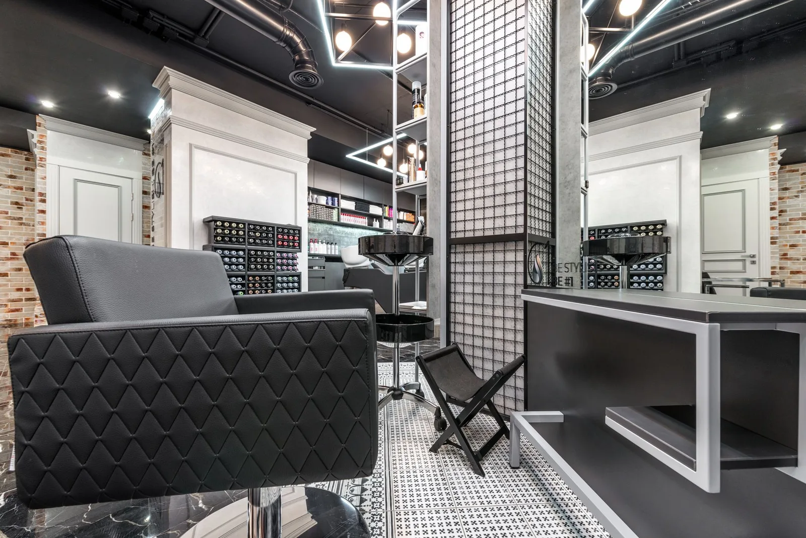 Interior of a modern hair salon with stylists at work