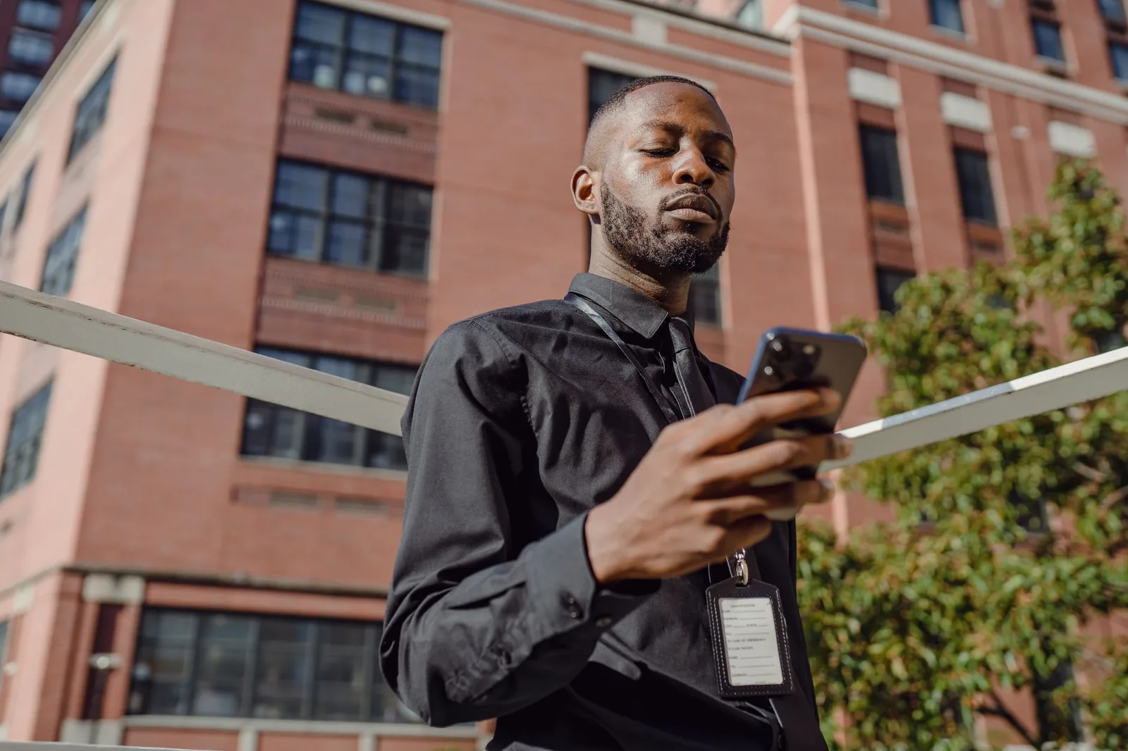 Person using a mobile phone to send appointment reminders