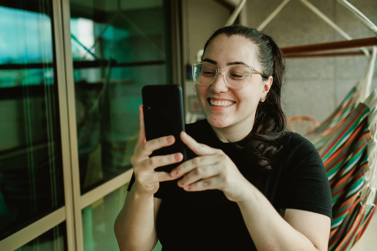 A client booking an appointment online from her phone