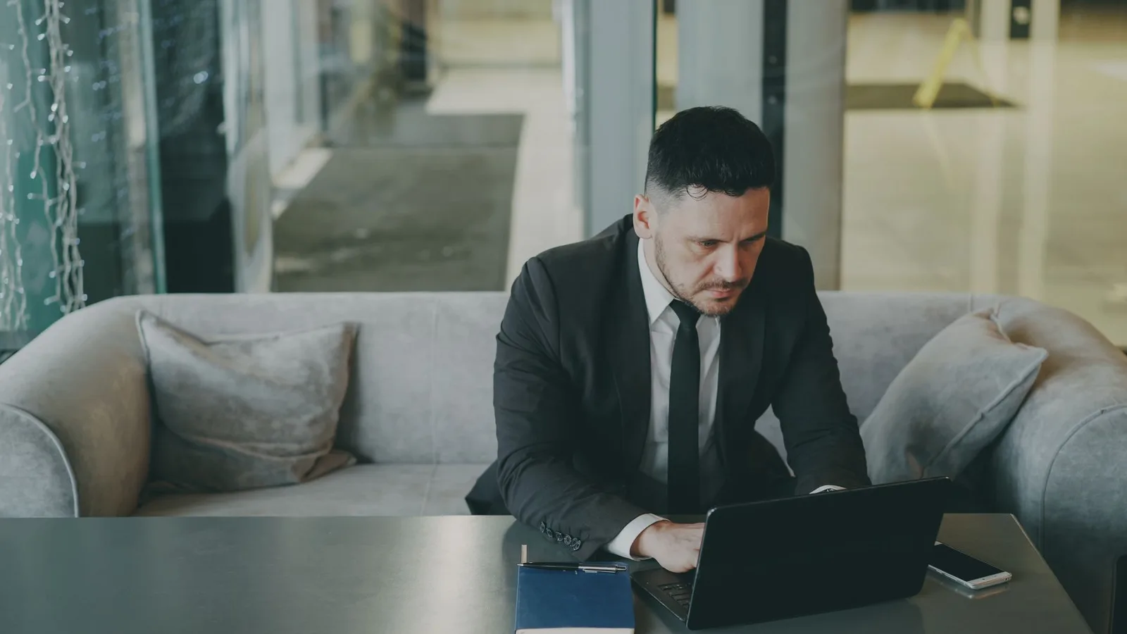 A business owner using online booking software