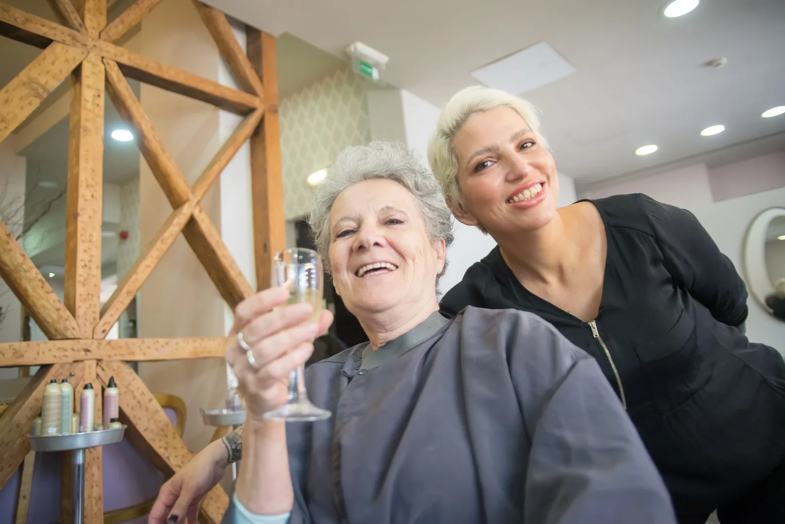 Salon staff managing schedules using a tablet