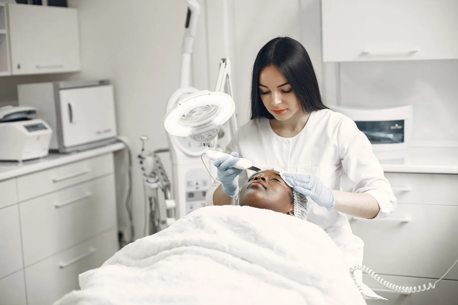 A serene skincare treatment room with soft lighting.