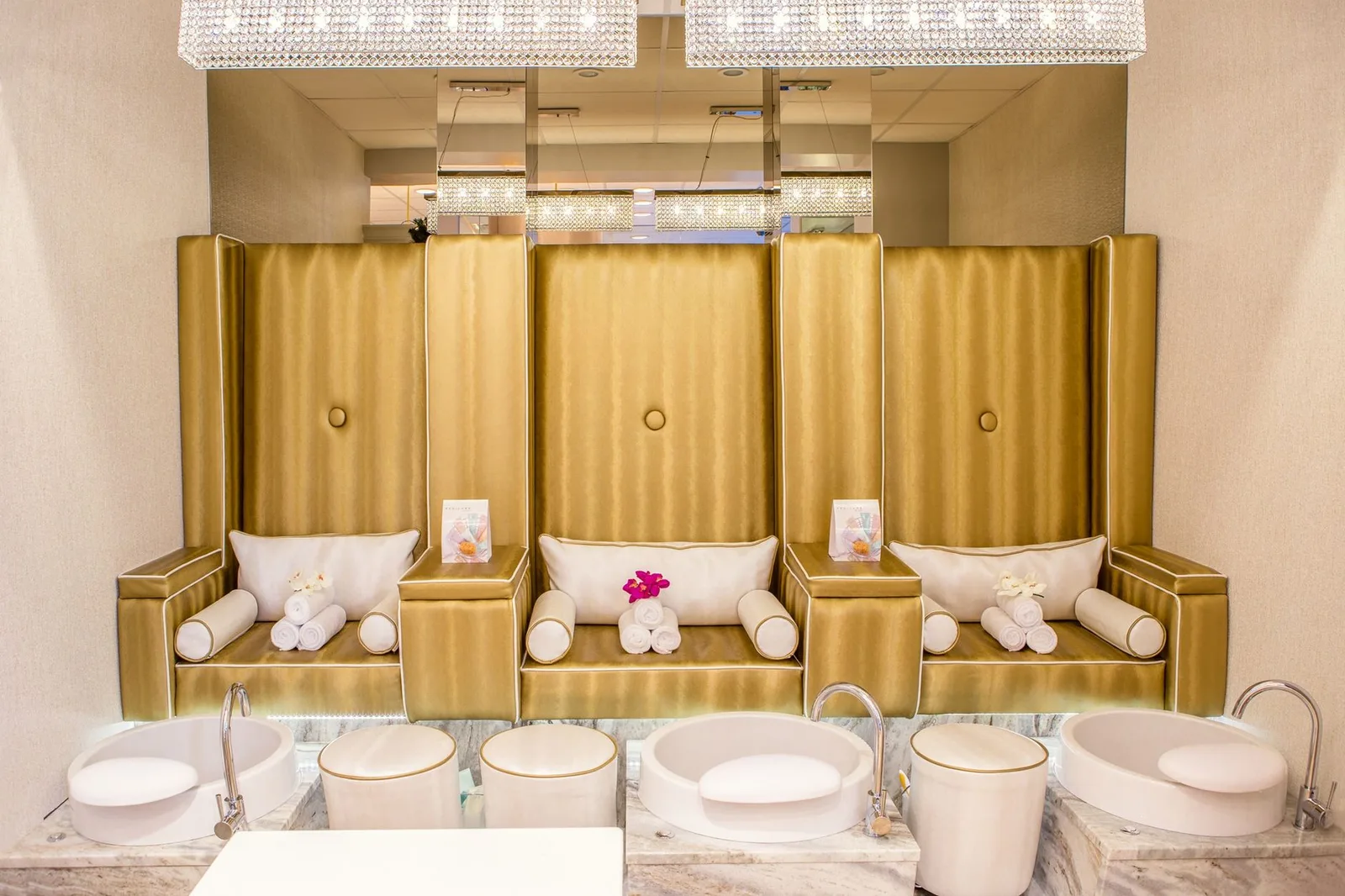 A serene spa interior with candles and a massage table