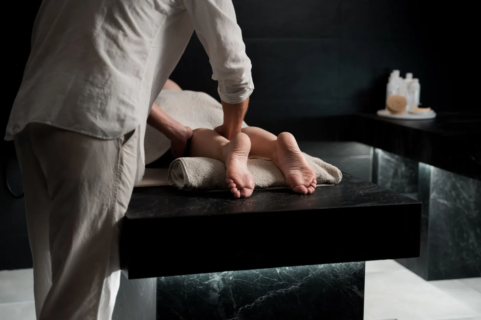 A massage therapy room with a comfortable table and soothing ambiance
